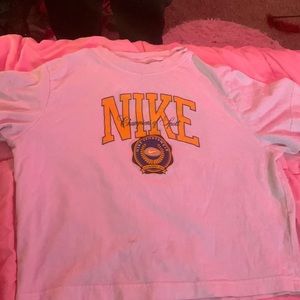 This a white nike tee size medium